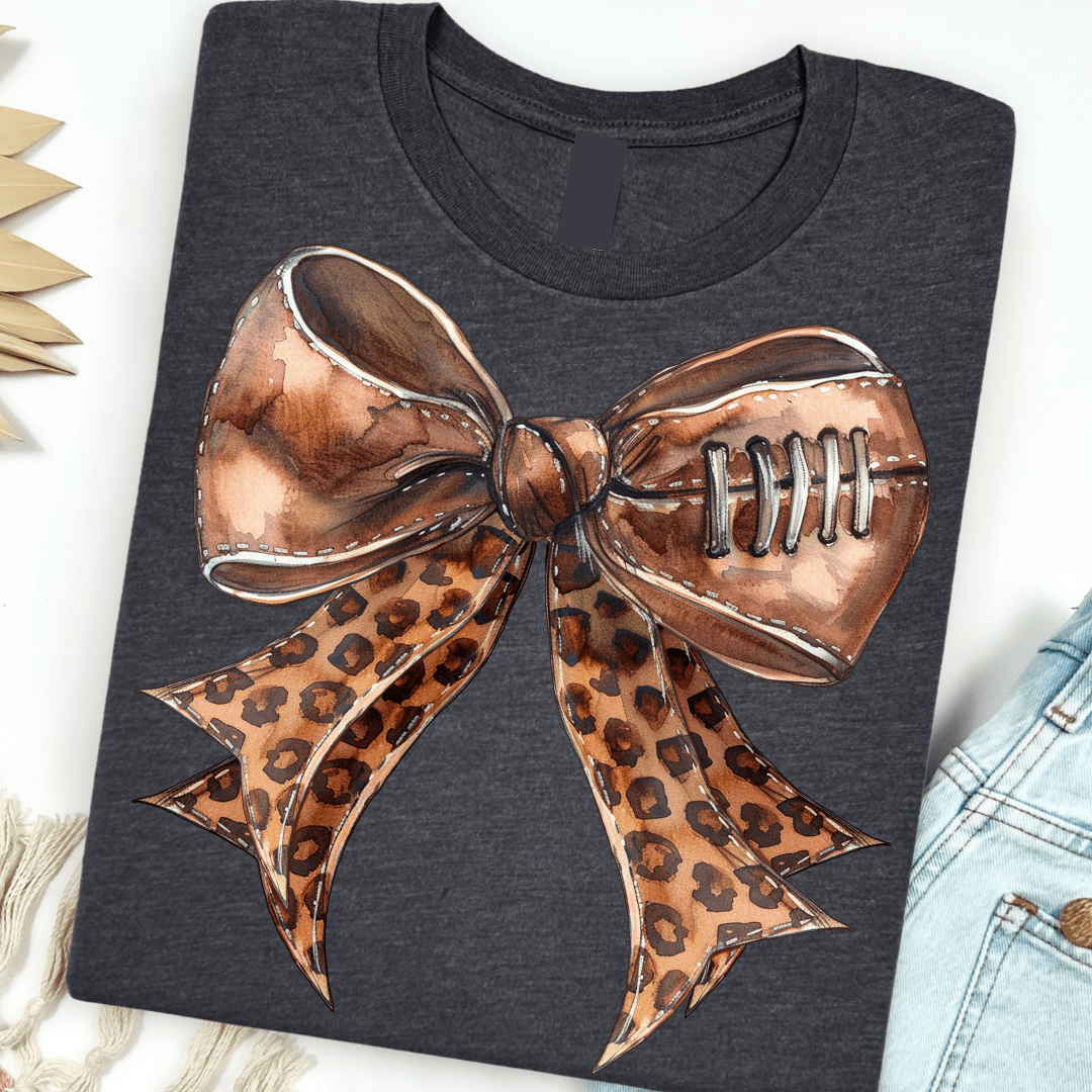 FestiviTees Women - Apparel - Shirts - T-Shirts Leopard Football Bow Graphic Tee
