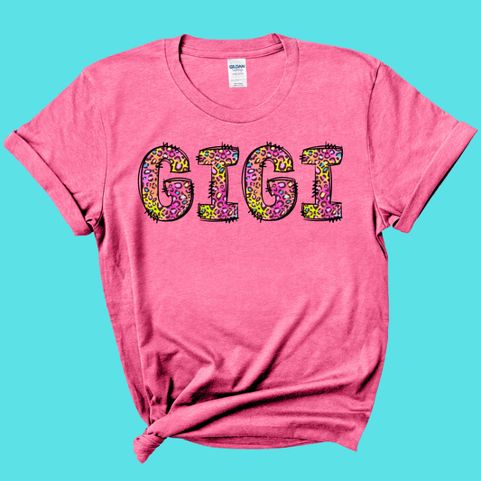 FestiviTees Apparel & Accessories > Clothing > Shirts & Tops Gigi Rainbow Leopard Graphic Tee