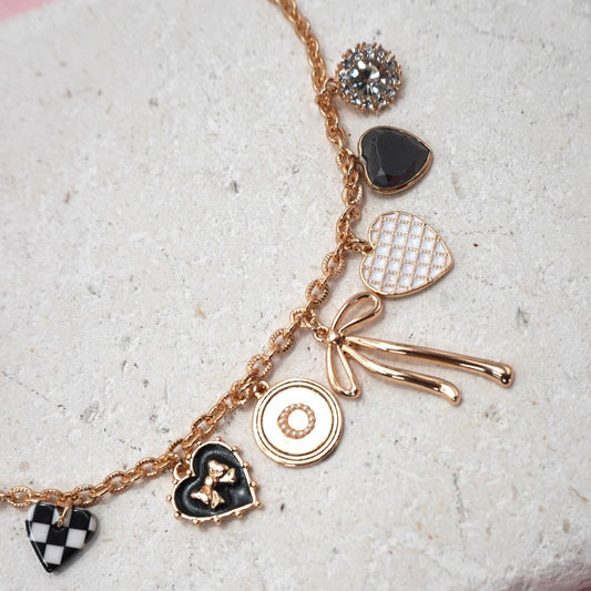 JOSSLYN by Wall to Wall Gold Bow Checker Heart Charm Necklace