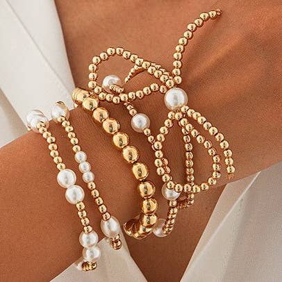 JOSSLYN by Wall to Wall Gold Multi Layer Pearl Bow Bracelet