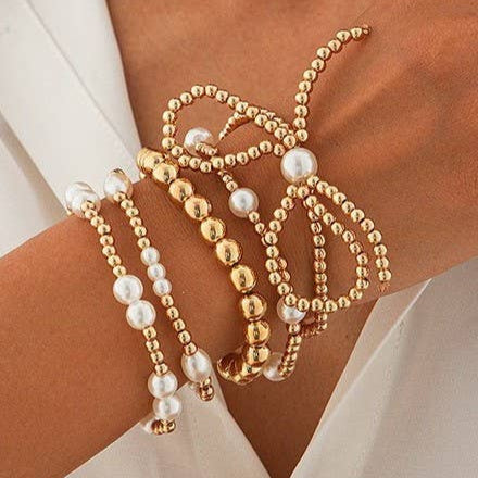 JOSSLYN by Wall to Wall Gold Multi Layer Pearl Bow Bracelet