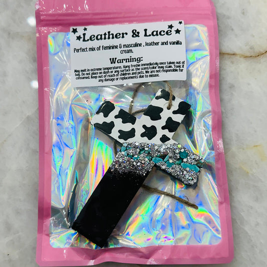 The Wild One Boutique Wholesale Fragrance - Car Freshies Leather & Lace Cow Print Sparkle Cross Freshie